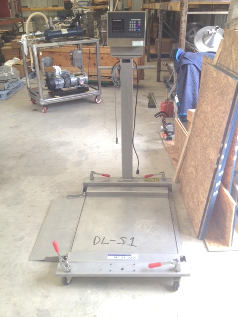 ***SOLD*** Used METTLER Stainless Steel portable Floor Scale. Model JAGXTREME. Fact. no. JXHA1000000. S/N 5505651-5MG.  Has one fold down ramp. From Pharmaceutical plant. 